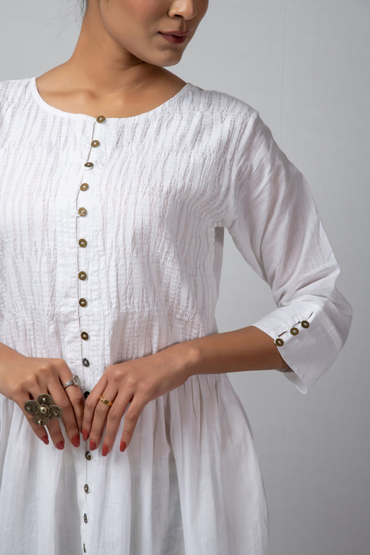 white smocked button down tunic + striped pants