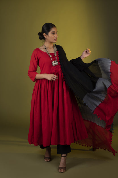 Red gathered dress with black pants and dupatta